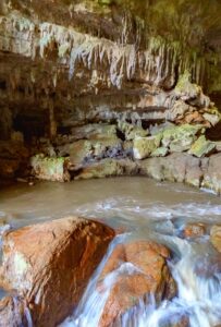 Water flowing inside the atm cave in belize