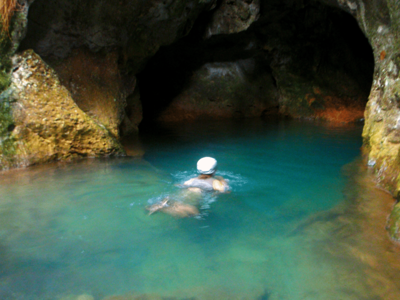 Swimming the ATM Cave entrance Belize