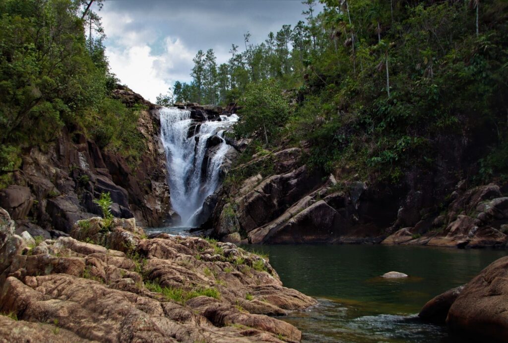 big rock falls secret waterfall near san ignacio, belize