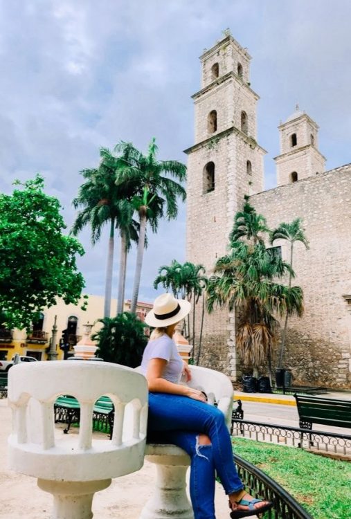 Merida lovers seats in front of cathedral